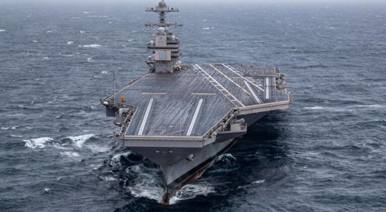 America’s Mighty Aircraft Carrier in Peril: Russian Submarine’s Daring Move Sparks Global Alarm!