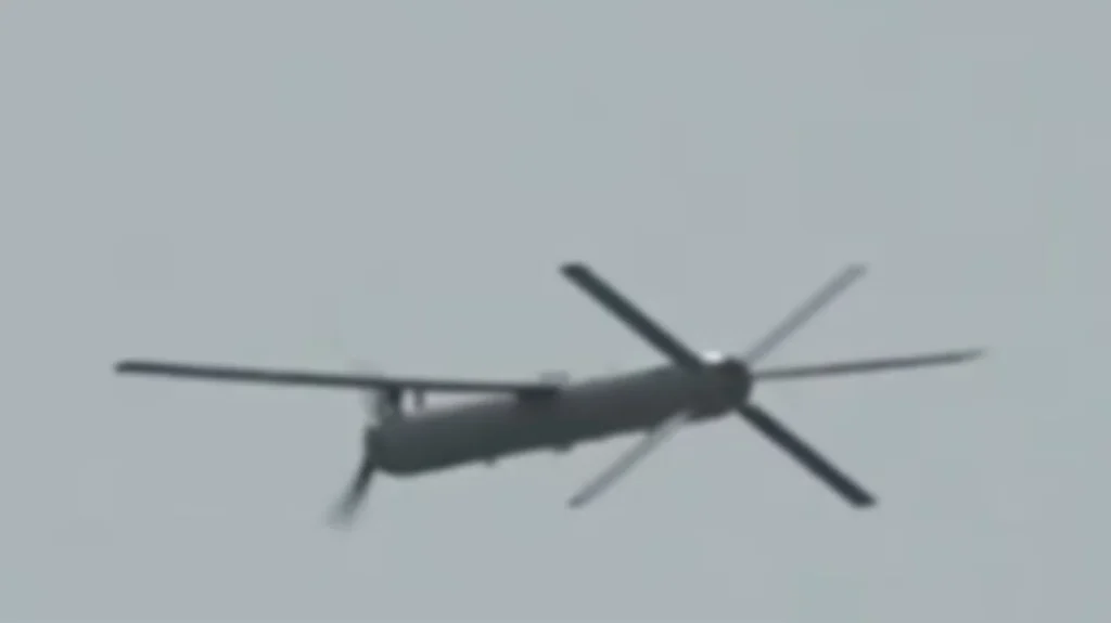 Modified Iranian Shahed-101 drone featuring a nose-mounted electric tractor propeller and X-shaped tail stabilizer