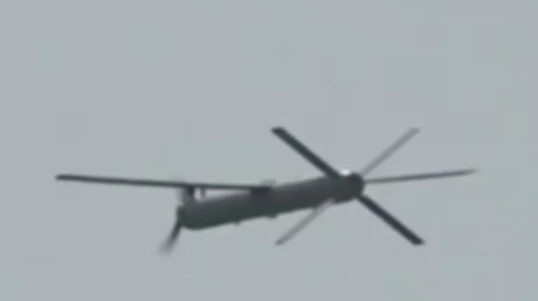 Modified Iranian Shahed-101 drone featuring a nose-mounted electric tractor propeller and X-shaped tail stabilizer