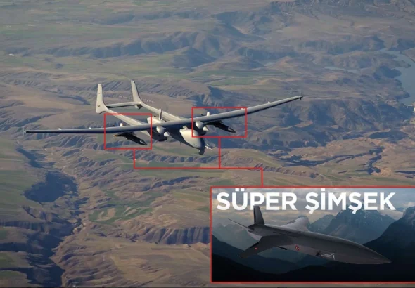 Turkish Aksungur unmanned combat aerial vehicle carrying two Super Simsek jet powered drones during a test flight