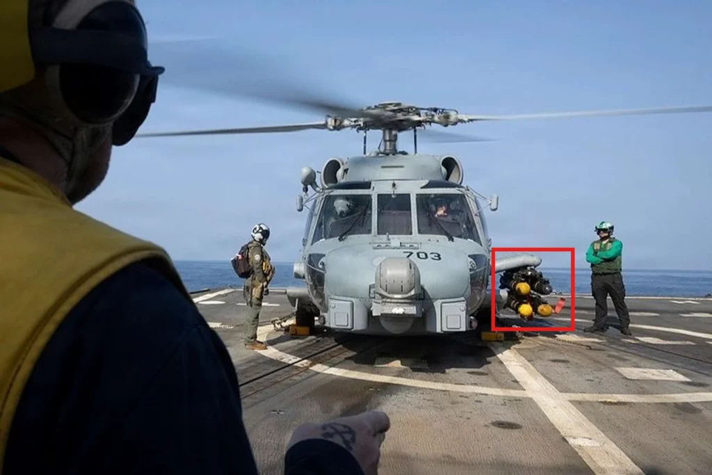 US Navy MH-60R Seahawk helicopter armed with Hellfire missiles operating from USS Delbert D. Black during Operation Epic Fury